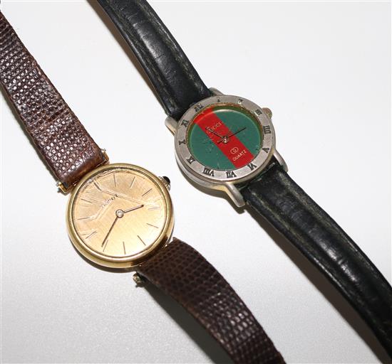 Ladies Tissot yellow gold wrist watch, with cabochon sapphire set winder and a Gucci wrist watch (2)(-)